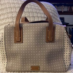 Like new Fossil purse. Medium sized purse that can be used as a crossbody